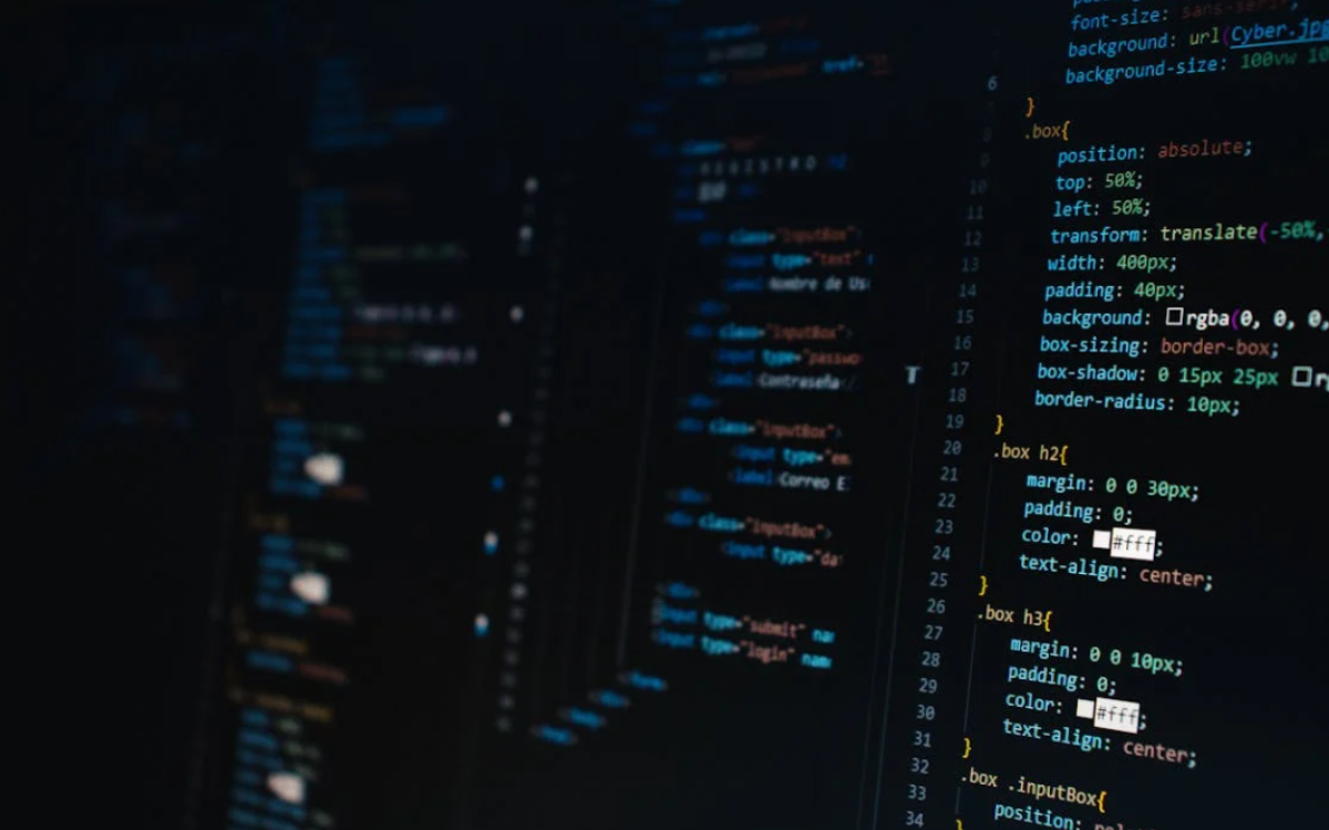 The screen shows a complex array of programming code, indicating the viewer's involvement in a technical or technology-related field such as software development.